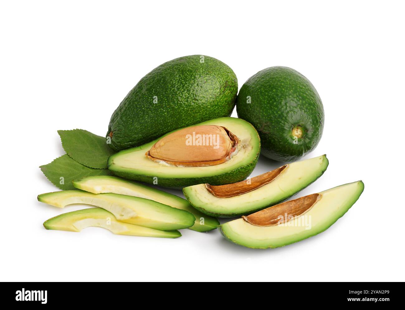 Fresh ripe avocados and leaves on white background Stock Photo - Alamy