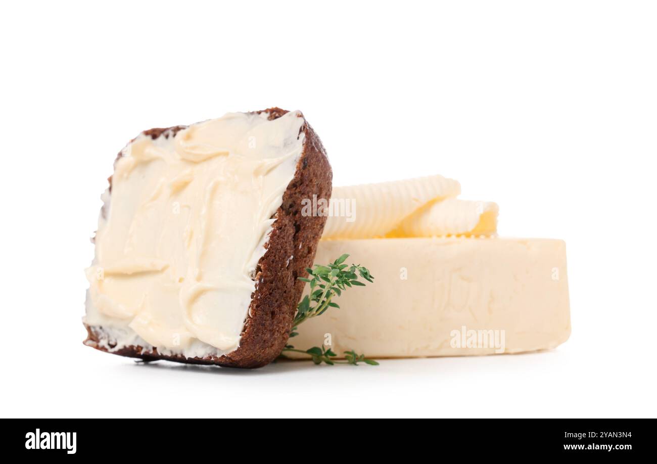 Slice of bread with fresh butter on white background Stock Photo - Alamy