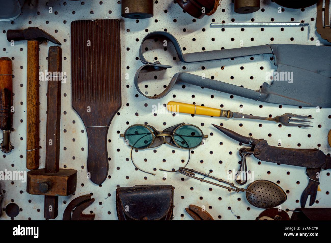 a-collection-of-old-hand-tools-arranged-on-the-wall-stock-photo-alamy