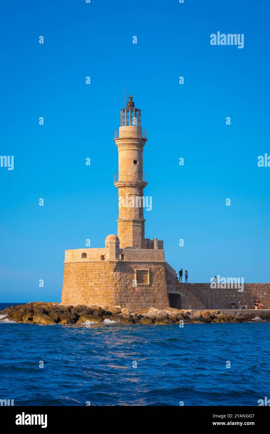 Chania lighthouse Crete, view in summer of the historic lighthouse sited in the Venetian harbour in Chania (Hania), north west Crete, Greece Stock Photo