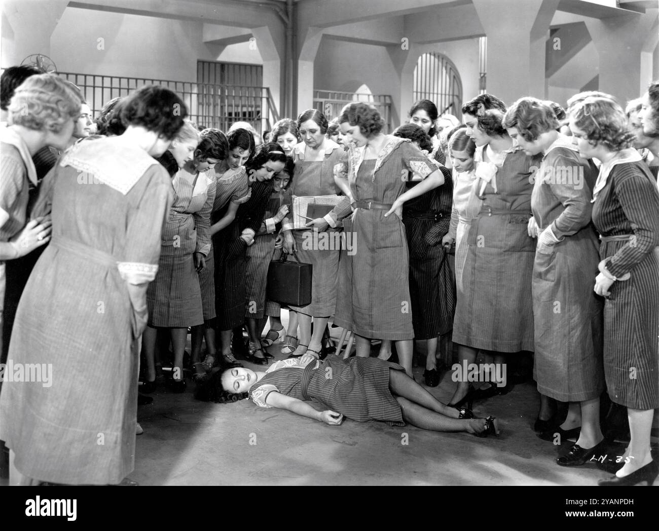 LILLIAN ROTH (on floor) BARBARA STANWYCK and DOROTHY BURGESS in women's prison in LADIES THEY TALK ABOUT 1933 directors HOWARD BRETHERTON and WILLIAM KEIGHLEY art direction Esdras  Hartley A Warner Bros. & Vitaphone Picture Stock Photo