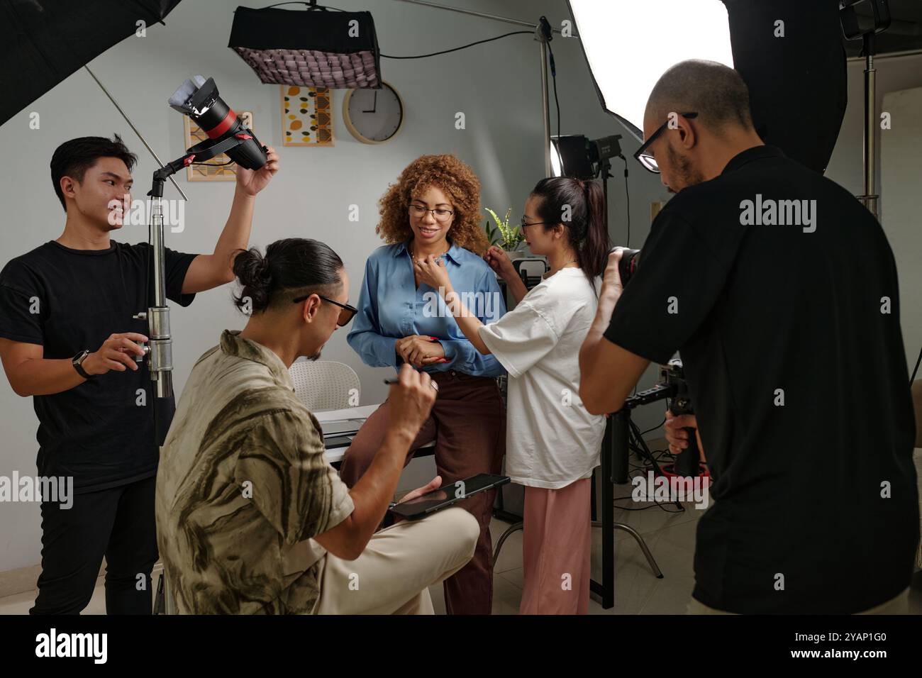 People Preparing Model For Shooting Stock Photo - Alamy