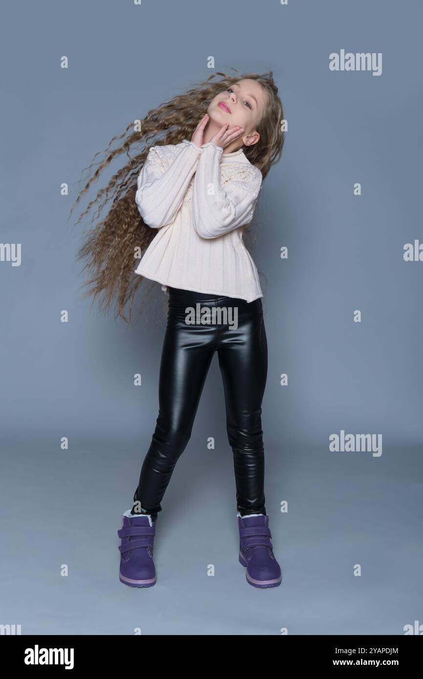 Girl long curly hair enjoys hi-res stock photography and images - Alamy