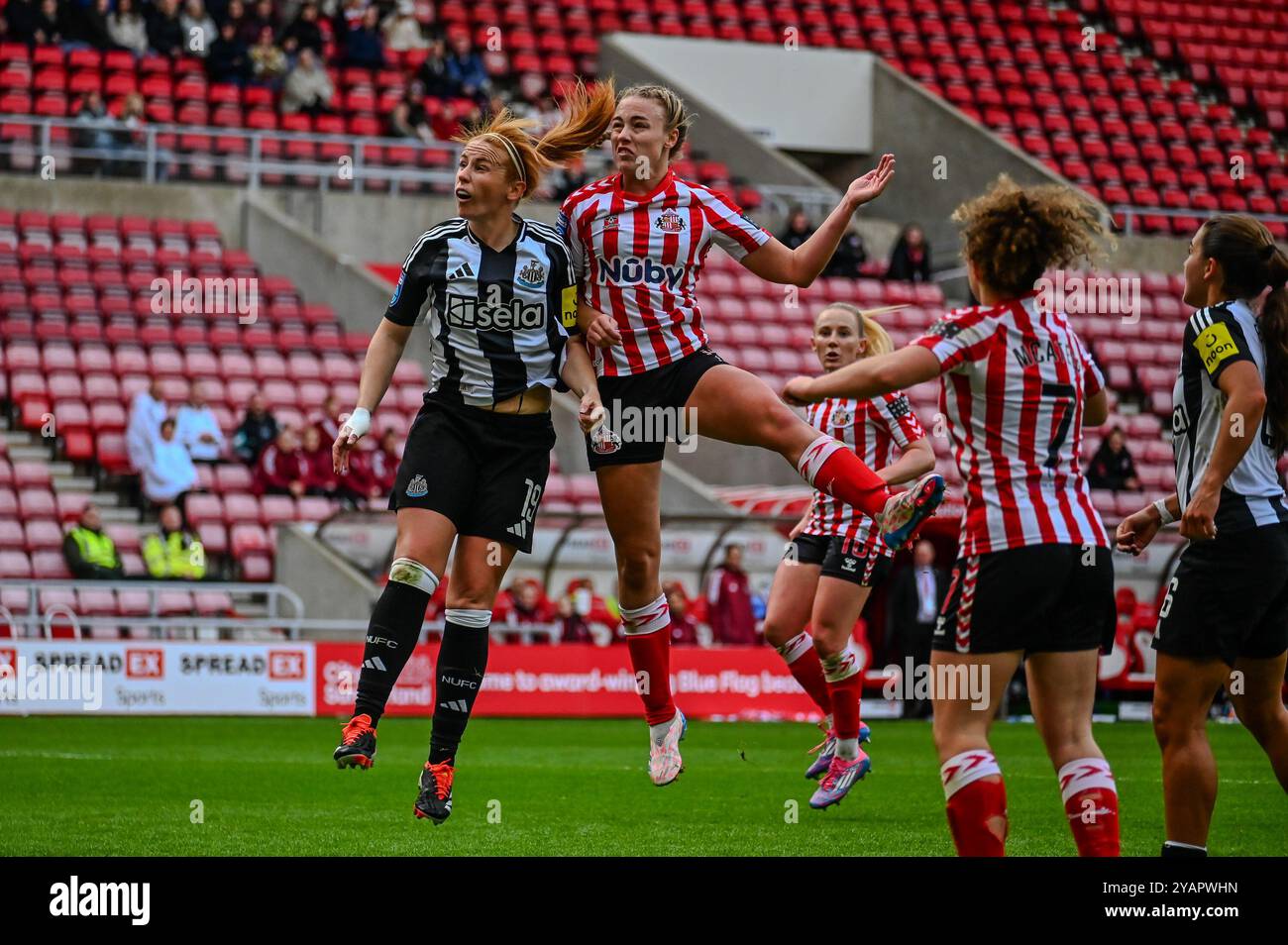 Sunderland Women's Eleanor Dale and Newcastle United's Rachel Furness challenge for the ball in the Wear Tyne Derby. Stock Photo