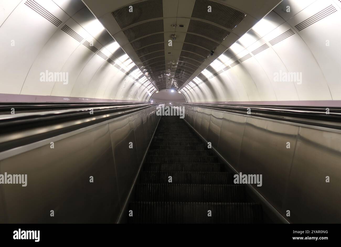 Moving escalator in subway station Stock Photo