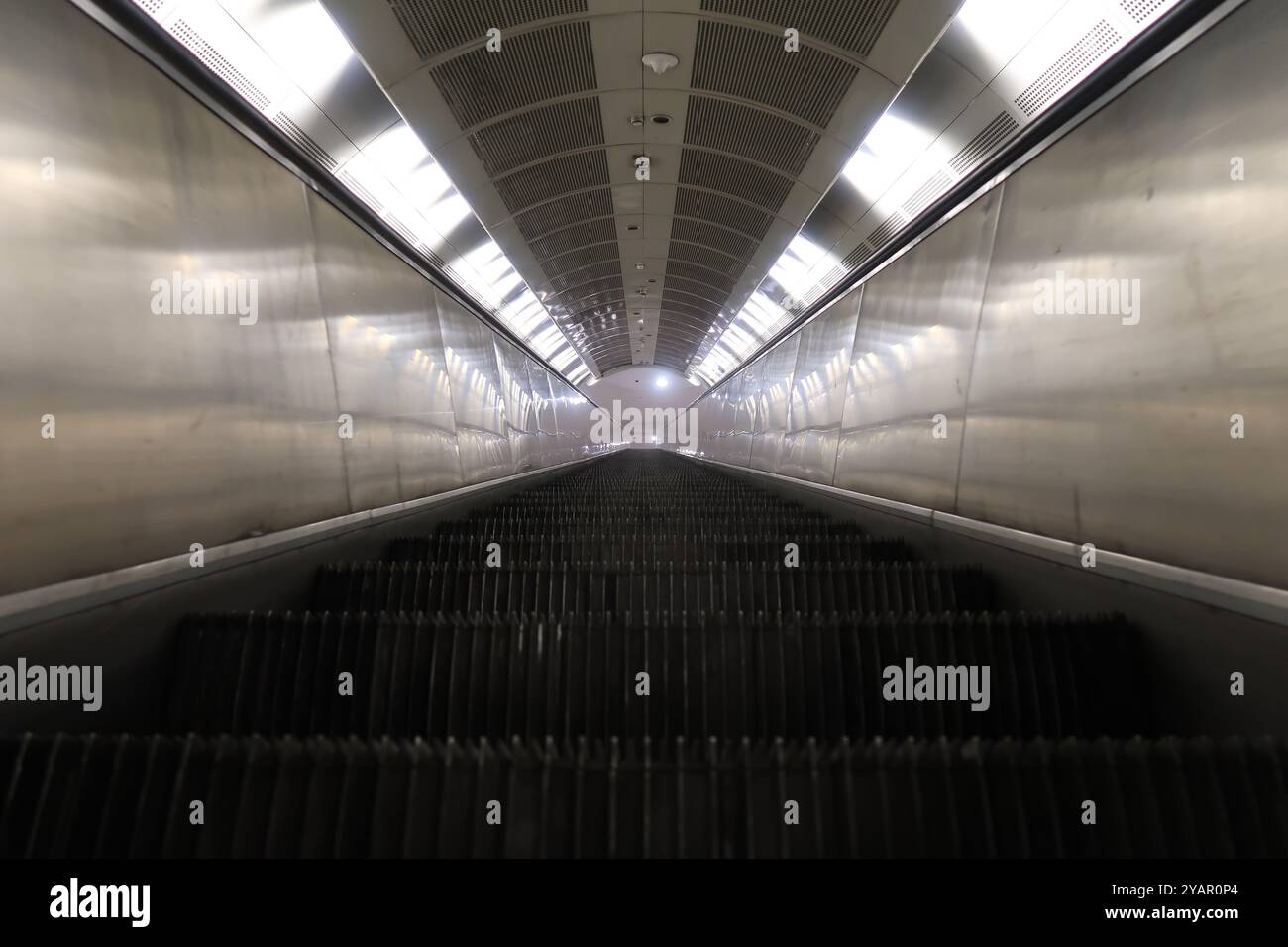 Moving escalator in subway station Stock Photo