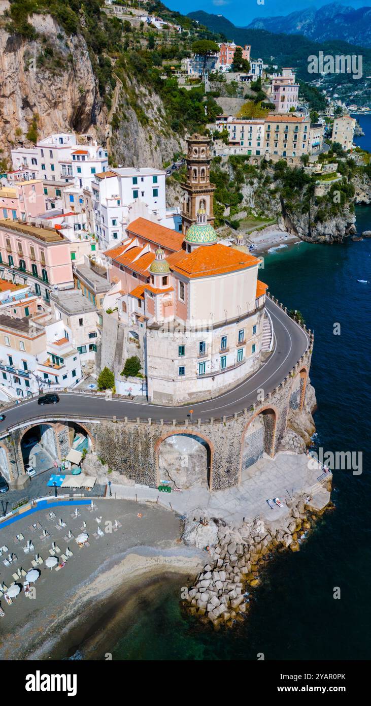 Colorful houses cling to the dramatic cliffs of the Amalfi Coast