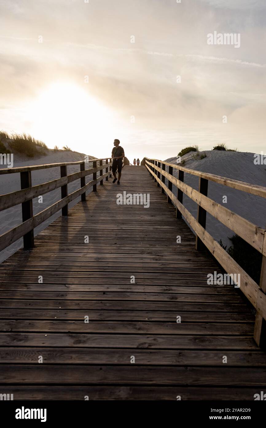Serenity dusk man walks hi-res stock photography and images - Alamy