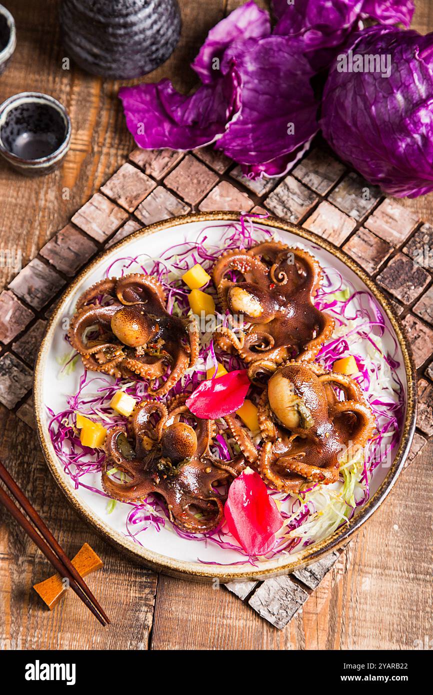 Crispy Deep fried baby Squid with Spicy Salt Stock Photo - Alamy
