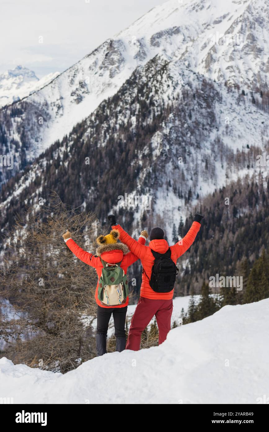 Couple hikers reaching top hi-res stock photography and images - Alamy