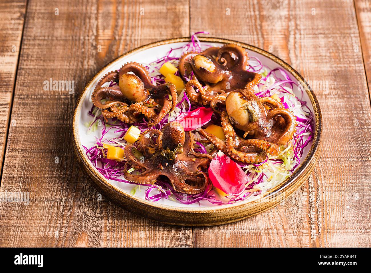 Crispy Deep fried baby Squid with Spicy Salt Stock Photo - Alamy