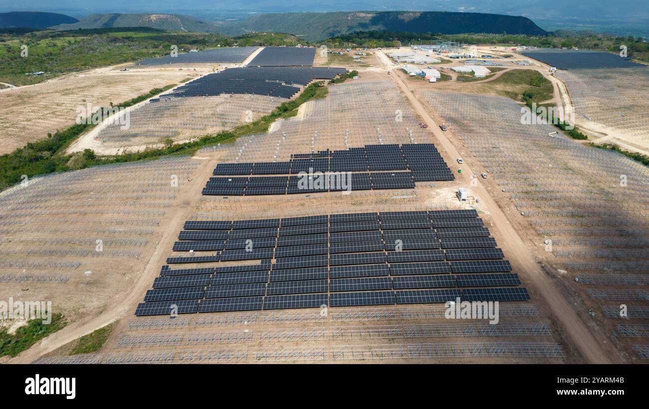Drone picture of mens working in a modern utility scale solar farm ...