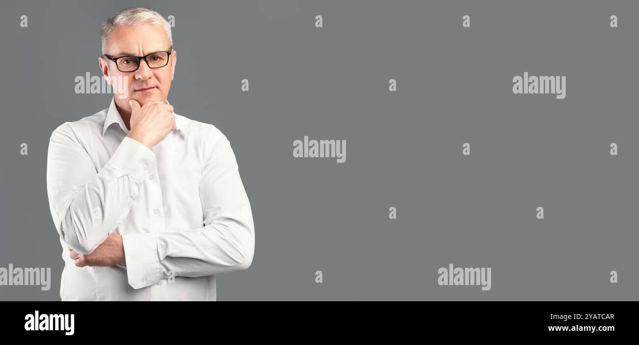 Pensive creative senior old man hi-res stock photography and images - Alamy