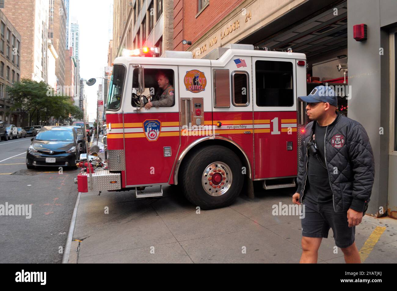 A New York City Fire Department firetruck is seen exiting an FDNY ...
