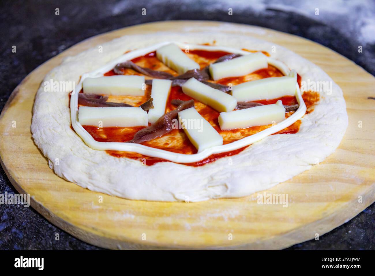 Classic rustic artisanal pizza with long-maturing dough Stock Photo - Alamy