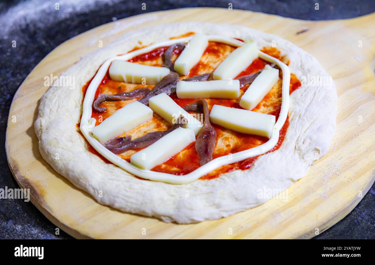 Classic rustic artisanal pizza with long-maturing dough Stock Photo - Alamy