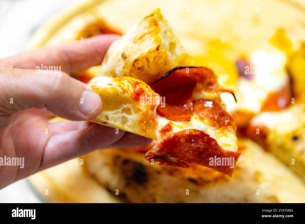 Classic rustic artisanal pizza with long-maturing dough Stock Photo - Alamy