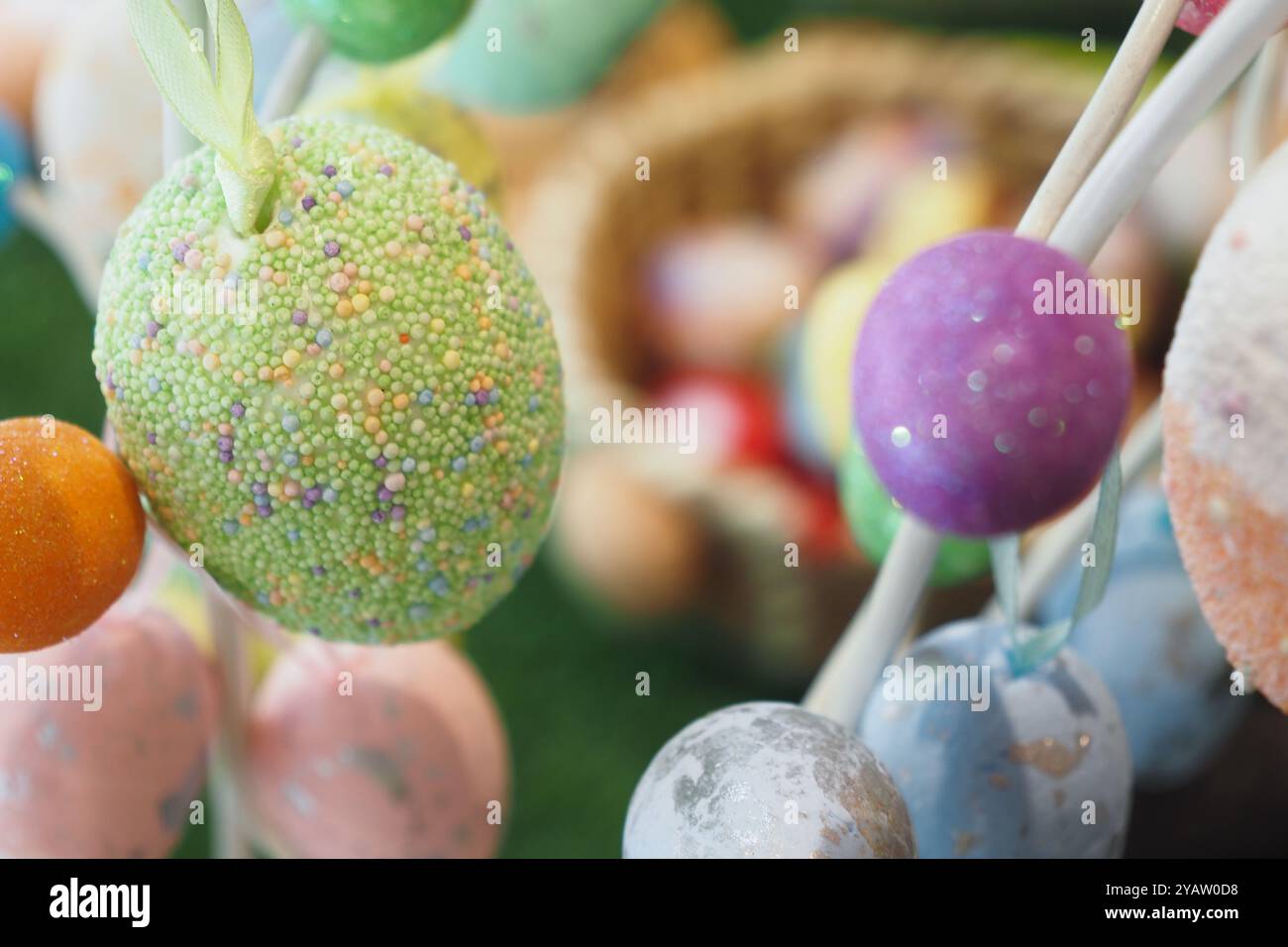 easter concept with multi color egg hanging on a decorative tree  Stock Photo