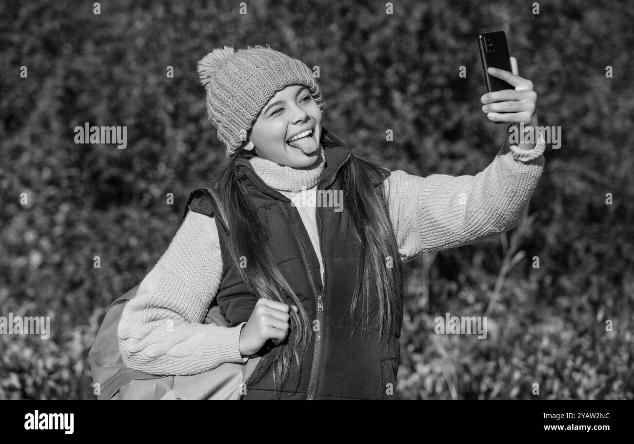 happy teen girl taking selfie with smartphone in autumn Stock Photo - Alamy