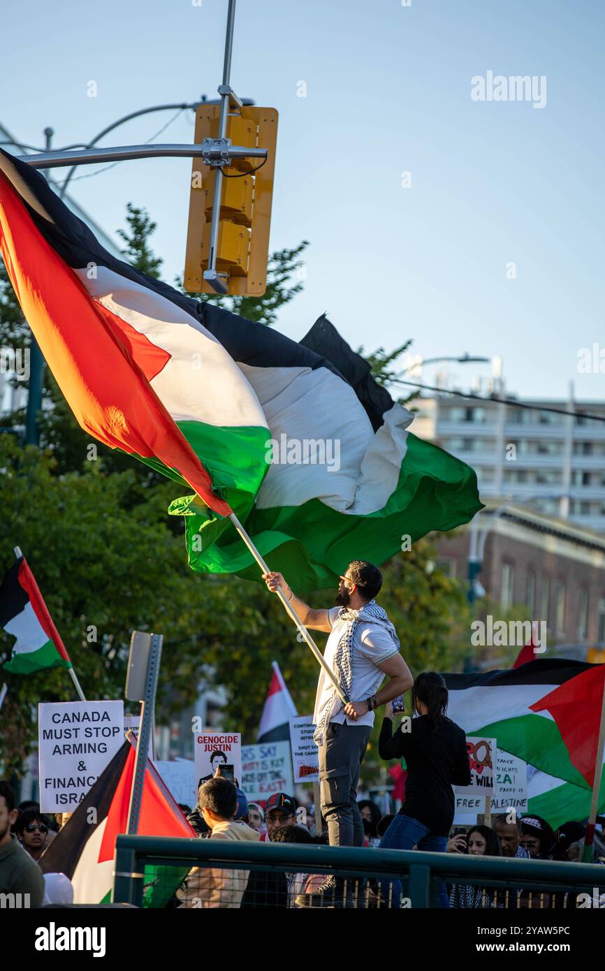 Pro Palestinian protesters take the streets of Toronto, on the one year anniversary of October 7 Stock Photo