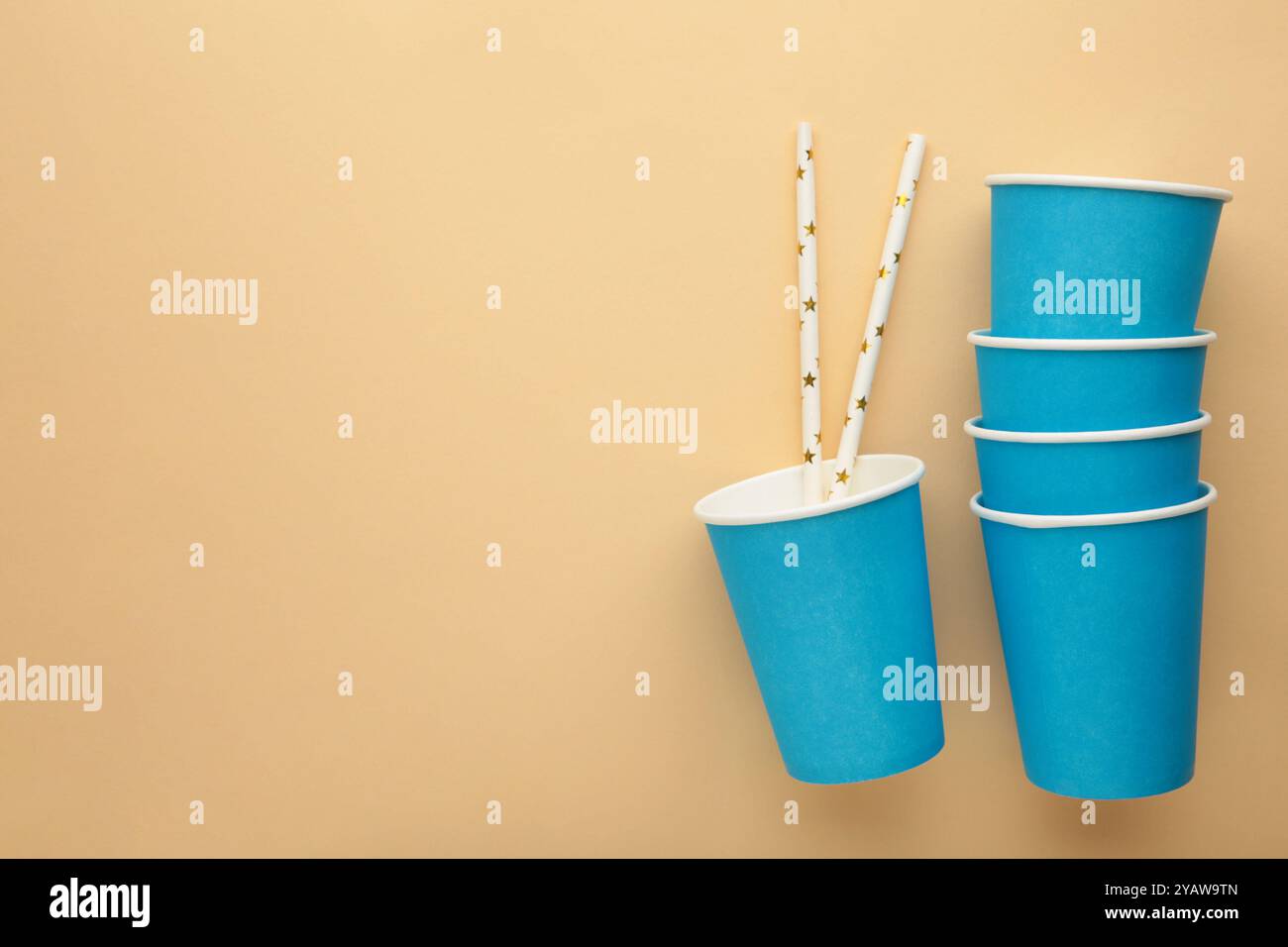 Paper disposable cup on beige background. Top view Stock Photo