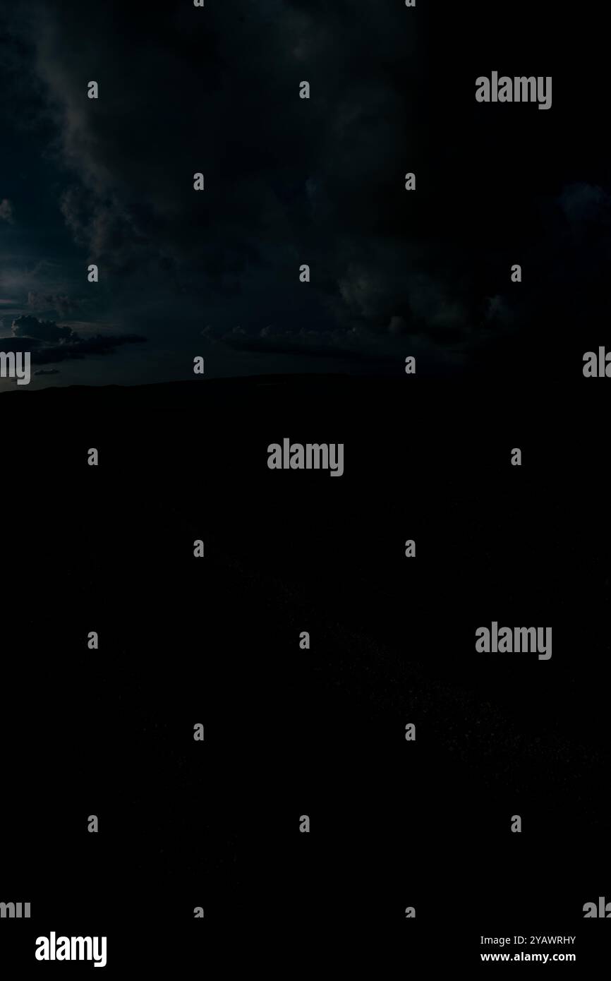 Dark low clouds silhouetted hi-res stock photography and images - Alamy