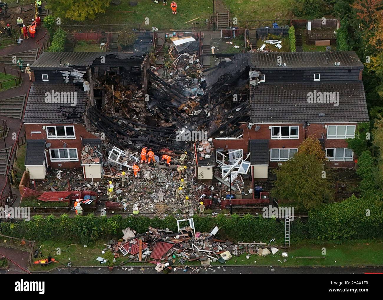 Emergency services at the scene at Violet Close in Benwell, Newcastle-Upon-Tyne, after three adults and one child were taken to hospital following a large fire in the residential street overnight. Emergency services were called to the incident shortly before 1am on Wednesday. Picture date: Wednesday October 16, 2024. Stock Photo