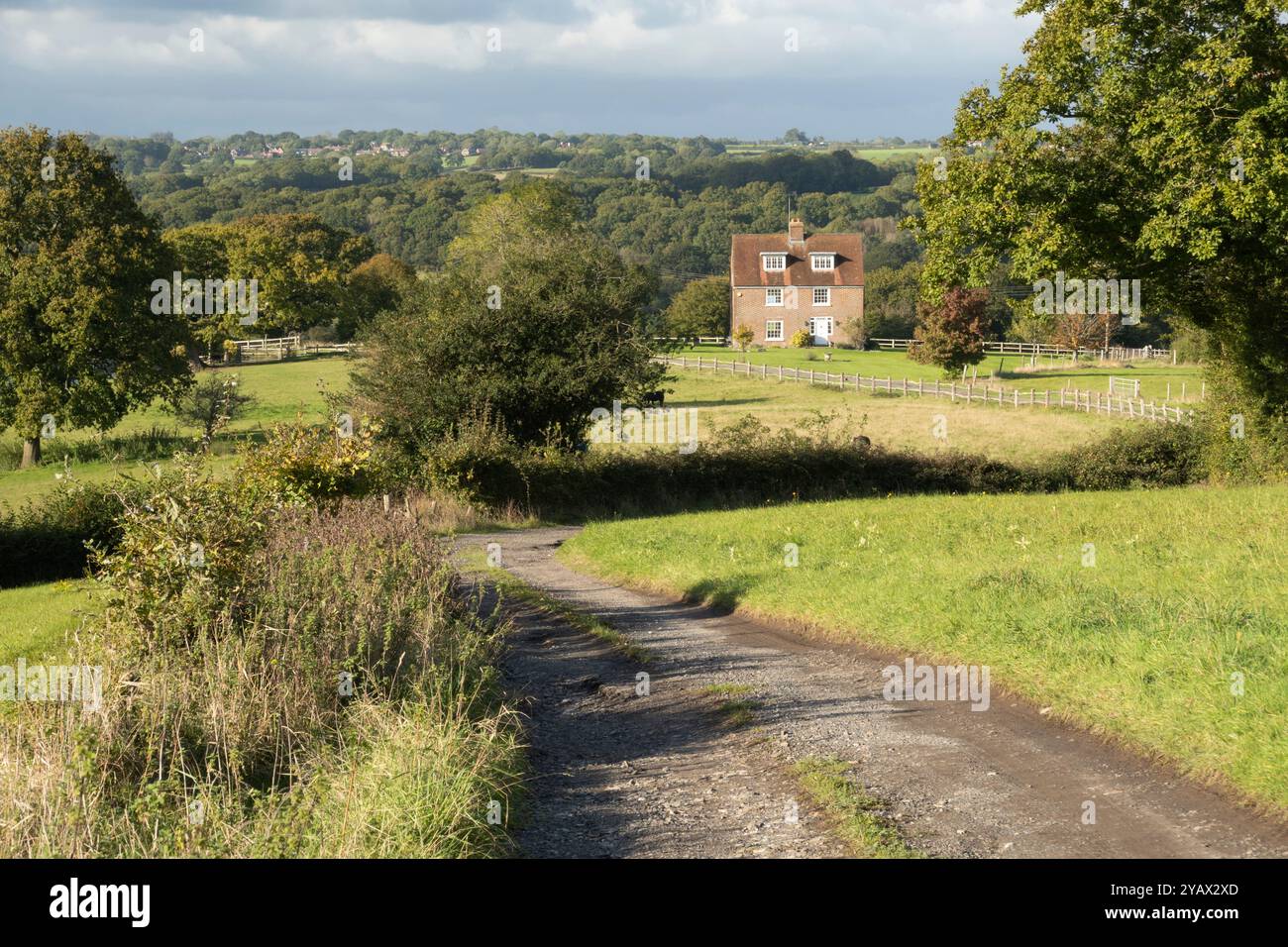 View of High Weald landscape with farmhouse along Ham Lane, Burwash, East Sussex, England, United Kingdom, Europe Stock Photo