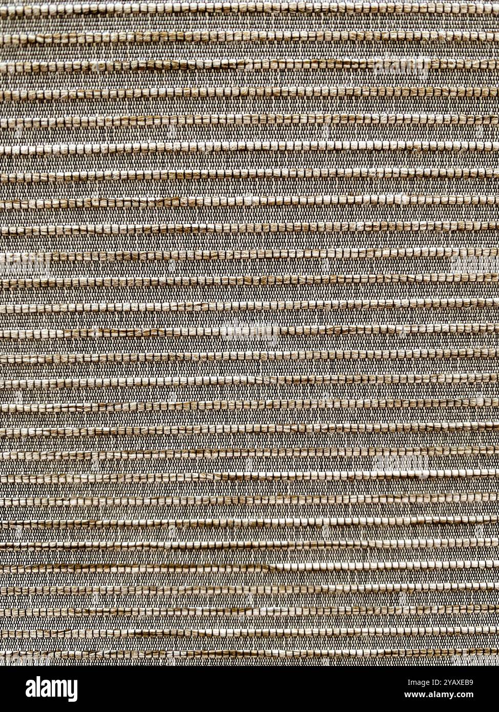 Beige and gold fabric heavily textured full frame background. A mobile phone photo with some phone or tablet post processing. - Smartphone Captured Stock Image