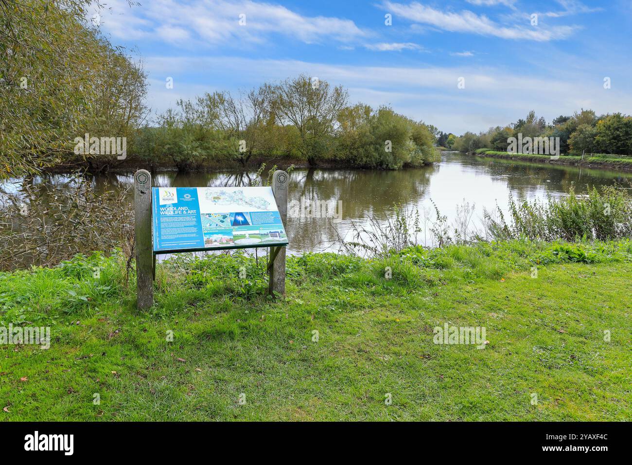 A sign, information board outlining Woodland, wildlife and art at the ...