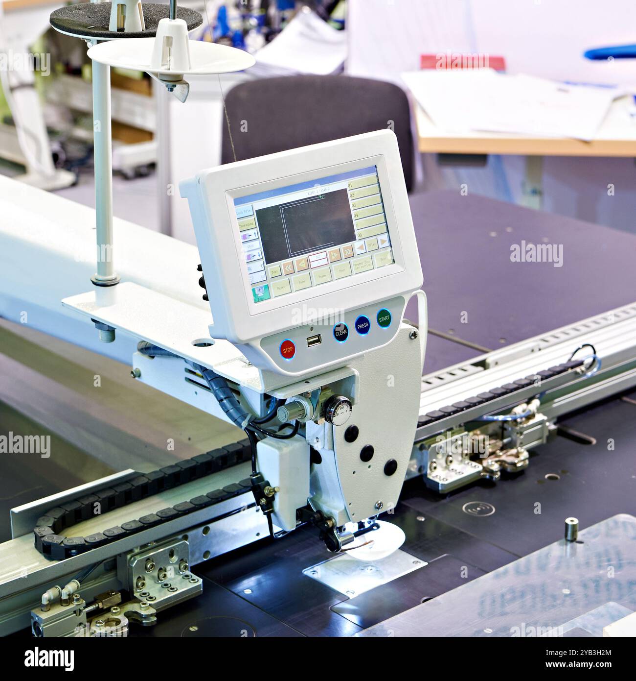 Programmable electronic large-area pattern sewing machine Stock Photo ...