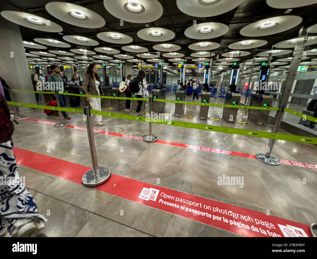 Going to automatic passport control gates, Barajas Airport, Madrid, Spain - Smartphone Captured Stock Image