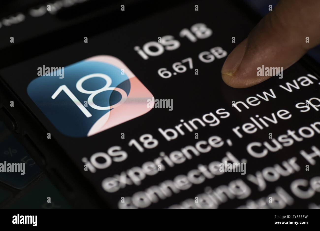 Ios Person In this photo illustration a person installs updates of Artificial ...
