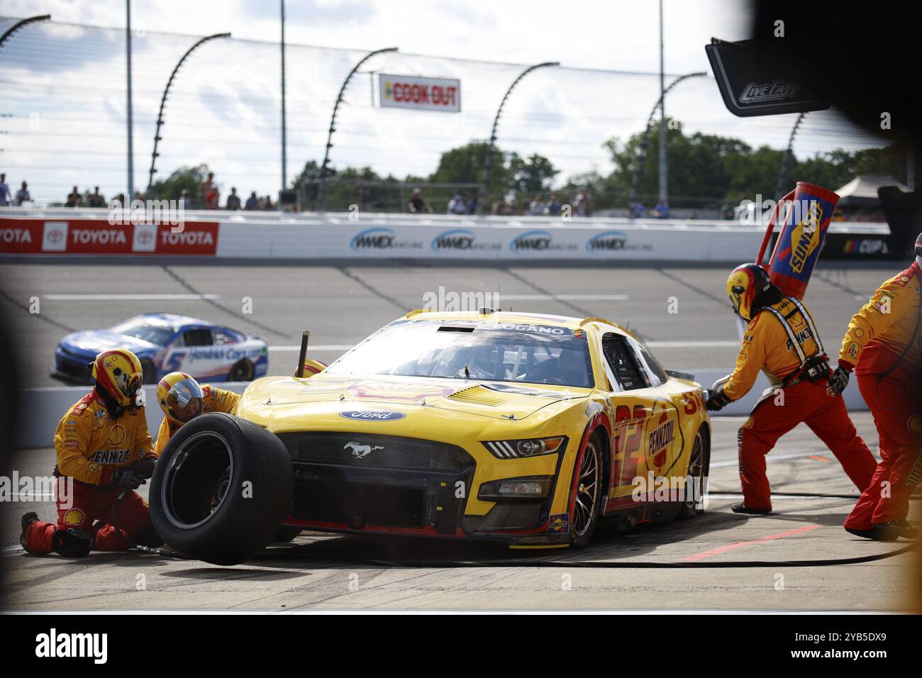 NASCAR Cup Series Driver, Joey Logano (22) makes a pit stop for the Cook Out 400 at the Richmond Raceway in Richmond VA Stock Photo