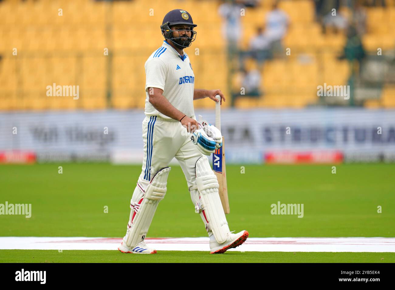 India's captain Rohit Sharma reacts as he walks off the field after ...