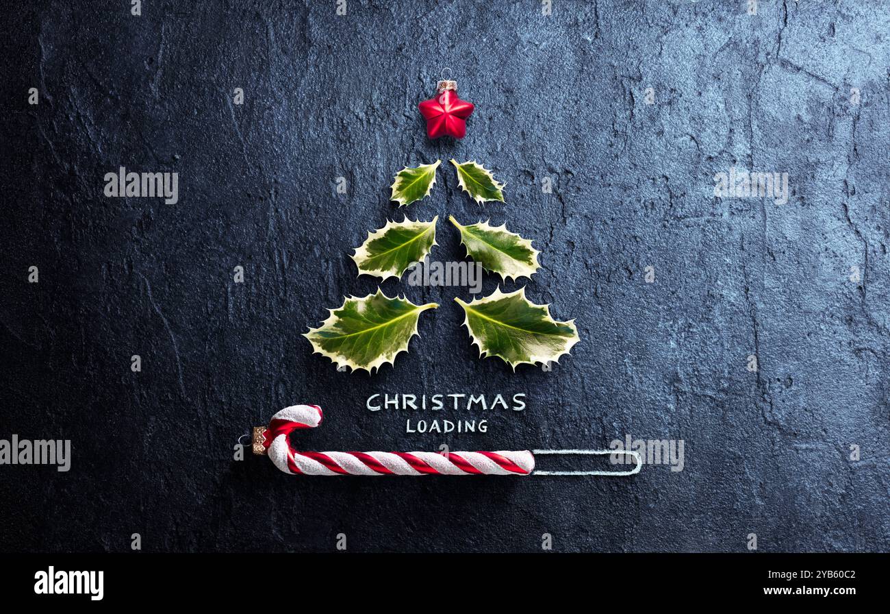 Christmas Loading Minimal Concept - Tree And Candy Canes On Dark Background Stock Photo