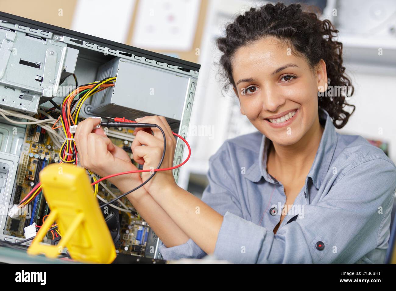 technician maintaining record of pc Stock Photo