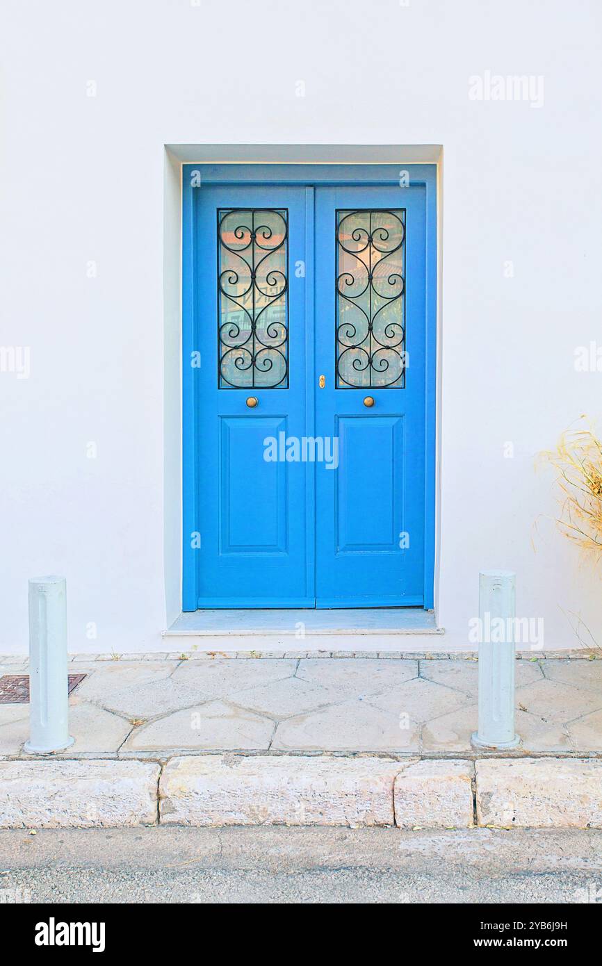 Blue door from a typical greek house with wall Stock Photo - Alamy