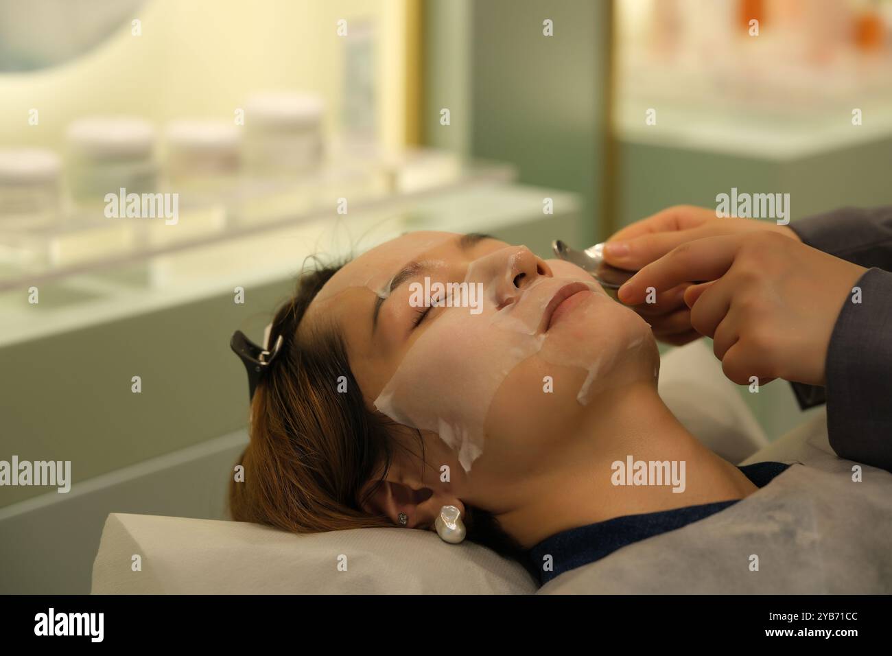 Beauty and woman and face mask hi-res stock photography and images - Alamy