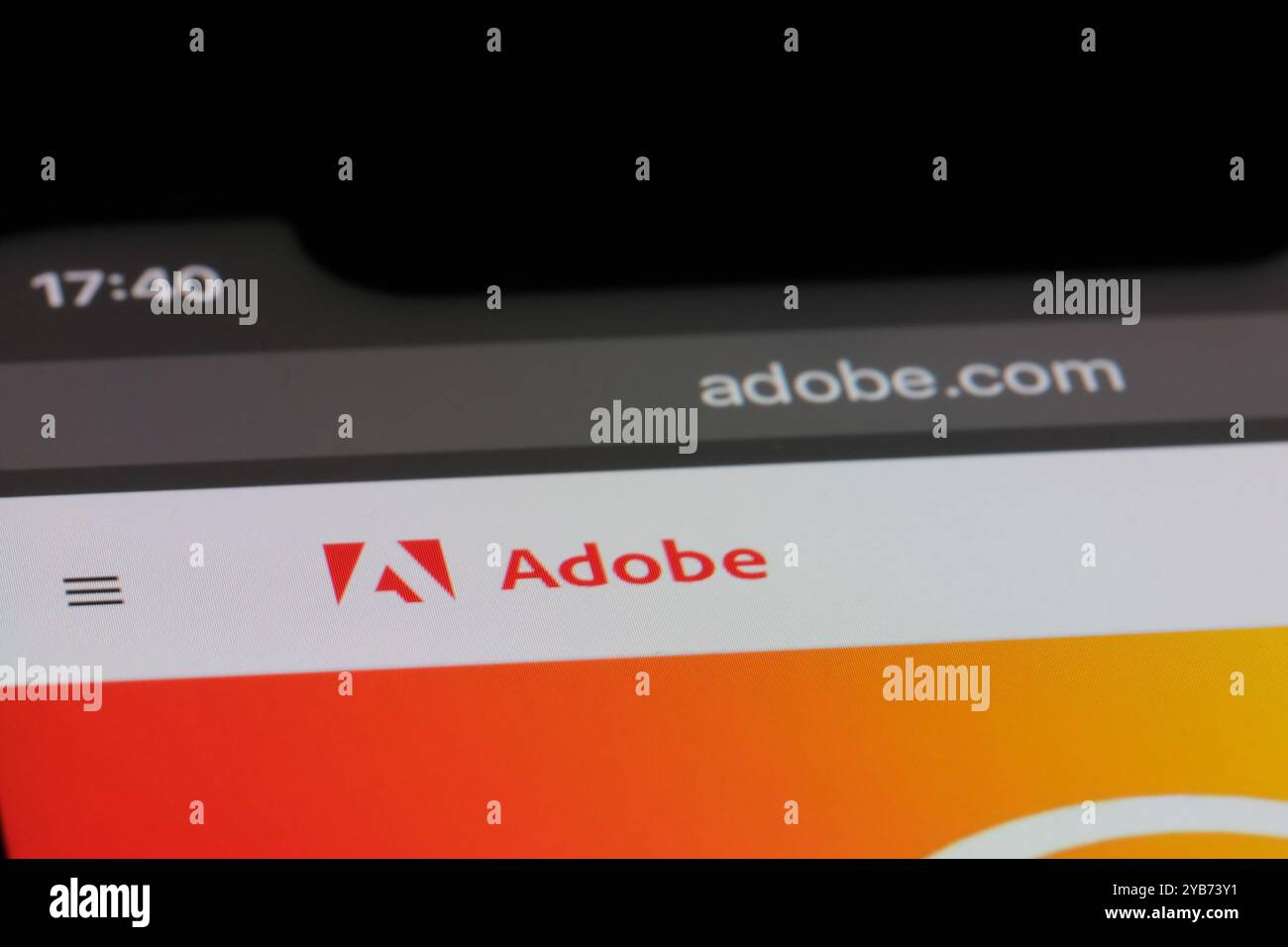 close up Adobe company brand logo on official website. American software company Stock Photo