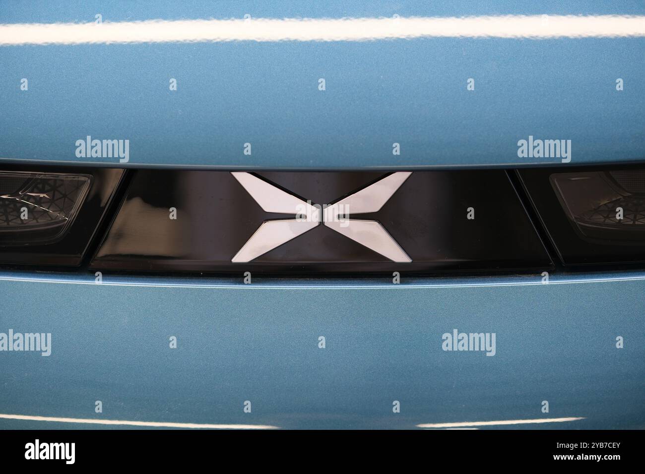 Shanghai,China-August 2nd 2023:  close up Xpeng Motors car logo.  Chinese electric car company Stock Photo