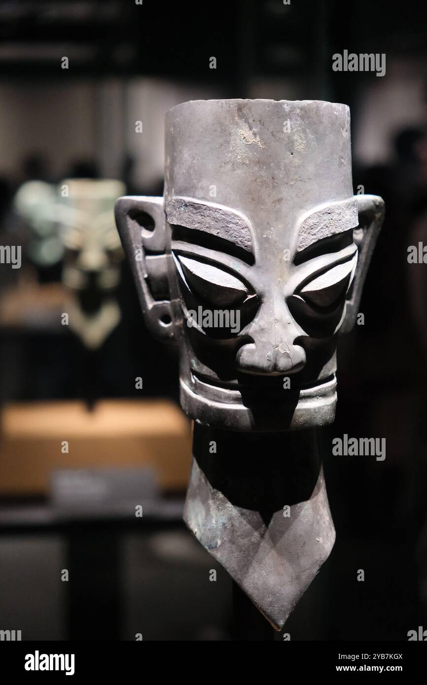 Shanghai,China-March 17th 2024: Bronze human head in museum. Ancient Shang dynasty artifact in Sanxingdui archaeological site Stock Photo