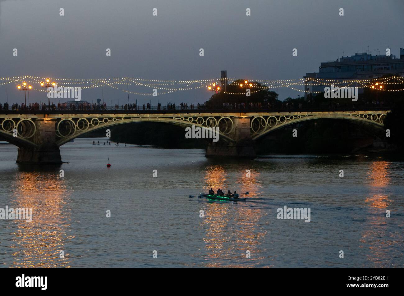 The Velá de Santiago y Santa Ana in Triana, a summer party in Seville. Spain Stock Photo