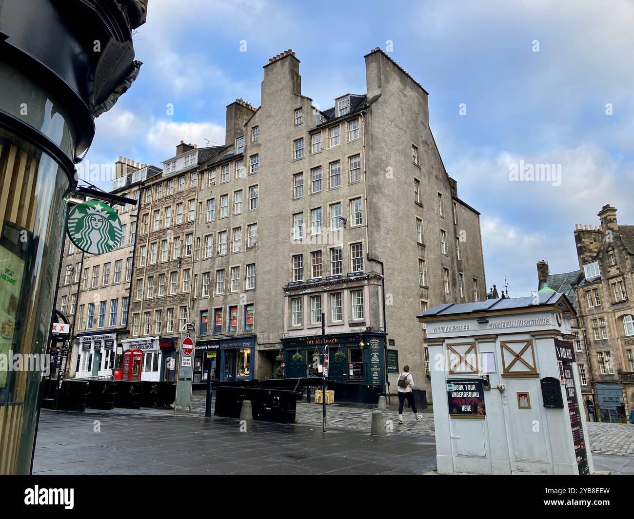 Buildings near Starbucks Coffee on High Street, part of The Royal Mile. Edinburgh, Scotland, United Kingdom. 16th March 2024. - Smartphone Captured Stock Image