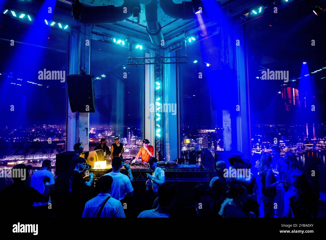 AMSTERDAM - Audiences during a show by DJ EZ, Trippy Tins, Yung Singh and SAIDAH at the A'DAM Tower. The concert is part of the Amsterdam Dance Event (ADE), a multi-day music event with parties and concerts throughout the city. ANP ROBIN UTRECHT netherlands out - belgium out Stock Photo