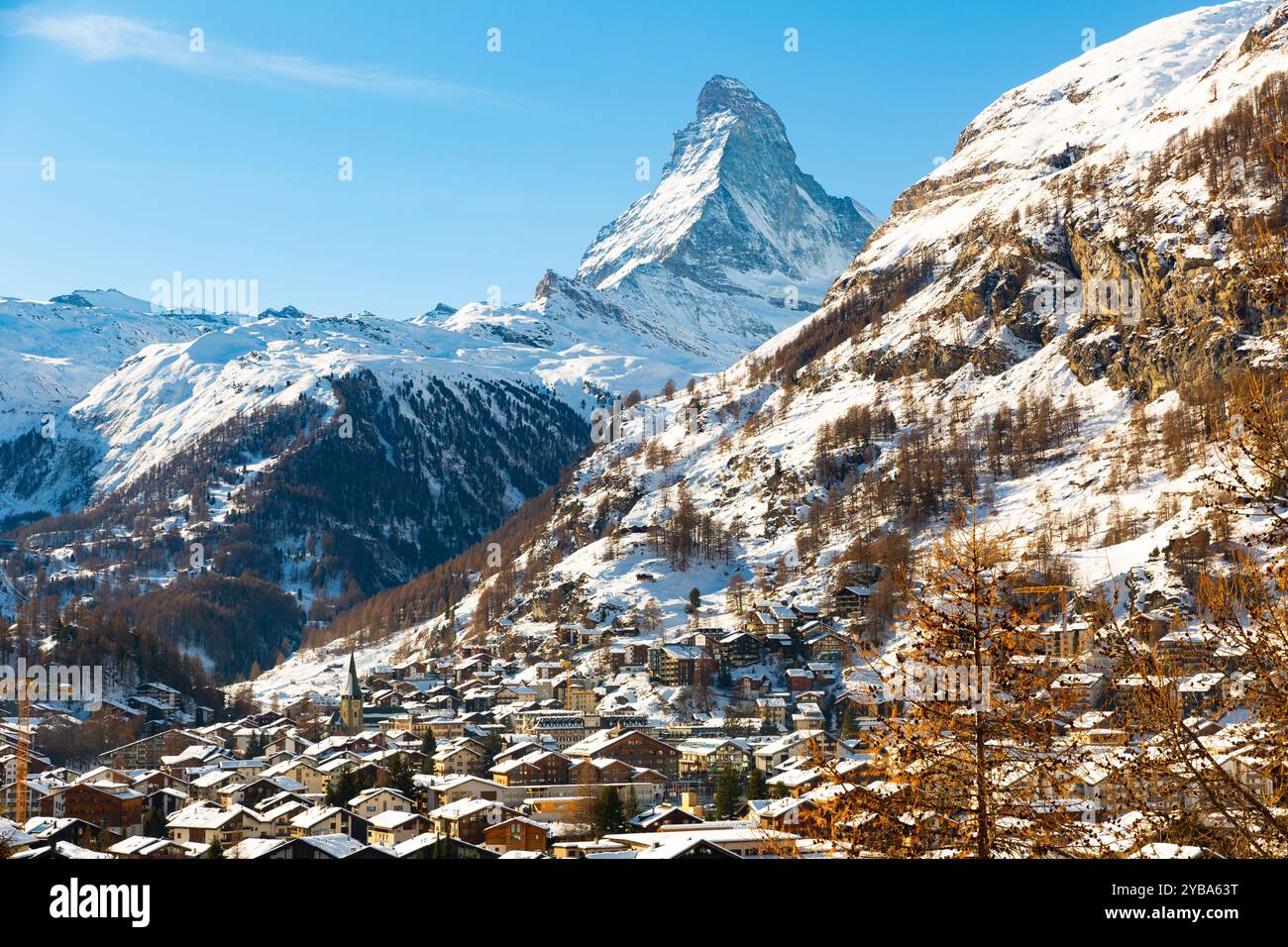 Snowing in Zermatt traditional Swiss ski resort under Matterhorn Stock ...