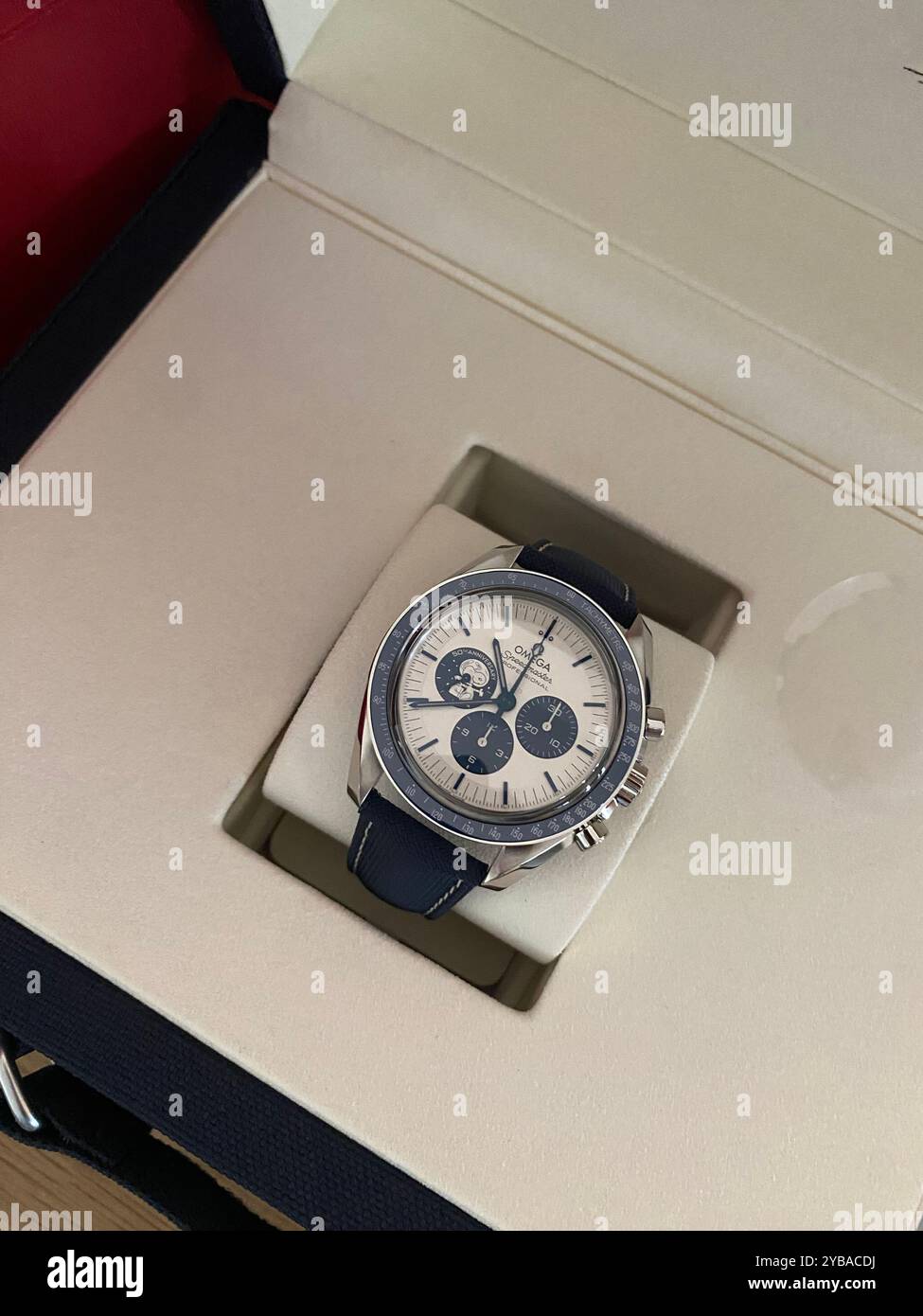 Omega watch, 50th anniversary 'eyes on the stars' silver snoopy award tribute to the award Omega received in 1970 from NASA astronauts for Apollo 13 - Smartphone Captured Stock Image