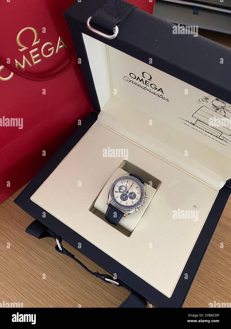 Omega watch, 50th anniversary 'eyes on the stars' silver snoopy award tribute to the award Omega received in 1970 from NASA astronauts for Apollo 13 - Smartphone Captured Stock Image