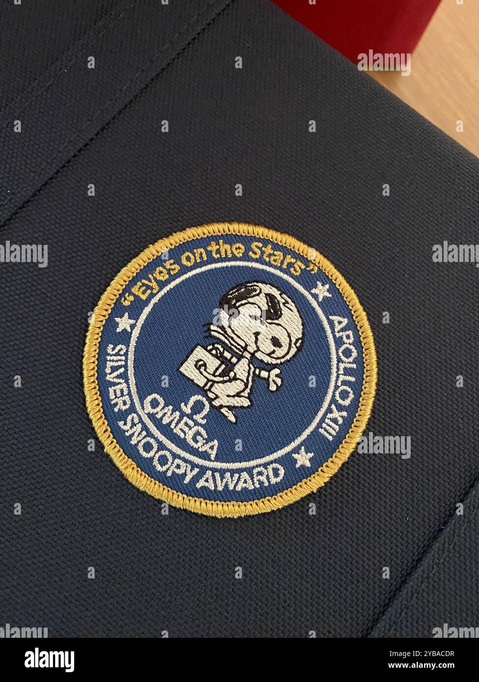 Omega watch, 50th anniversary 'eyes on the stars' silver snoopy award tribute to the award Omega received in 1970 from NASA astronauts for Apollo 13 - Smartphone Captured Stock Image