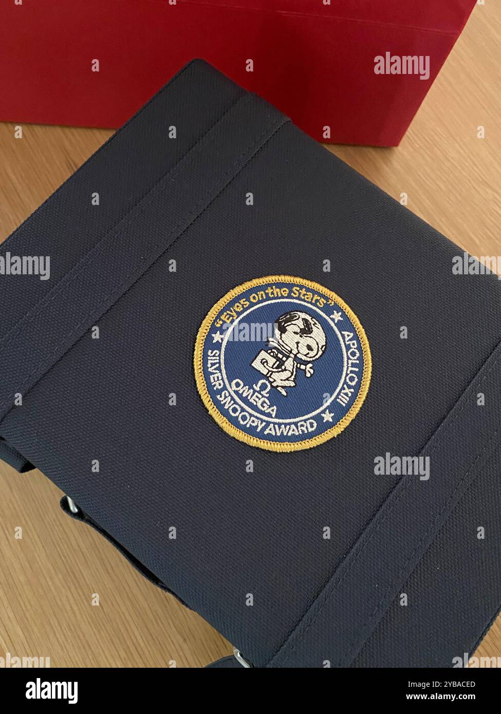 Omega watch, 50th anniversary 'eyes on the stars' silver snoopy award tribute to the award Omega received in 1970 from NASA astronauts for Apollo 13 - Smartphone Captured Stock Image